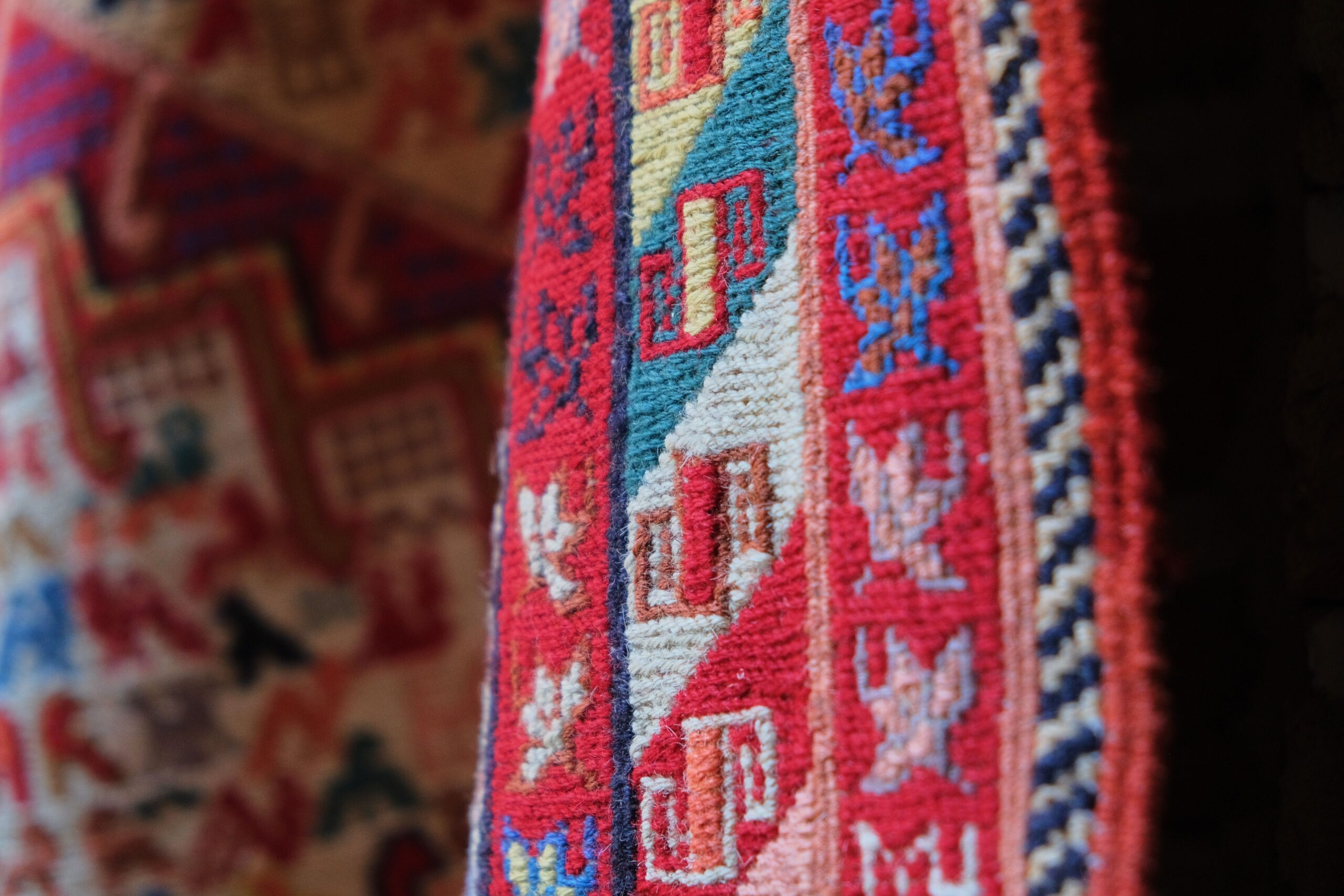 Close up of a Persian rug with traditional patterns